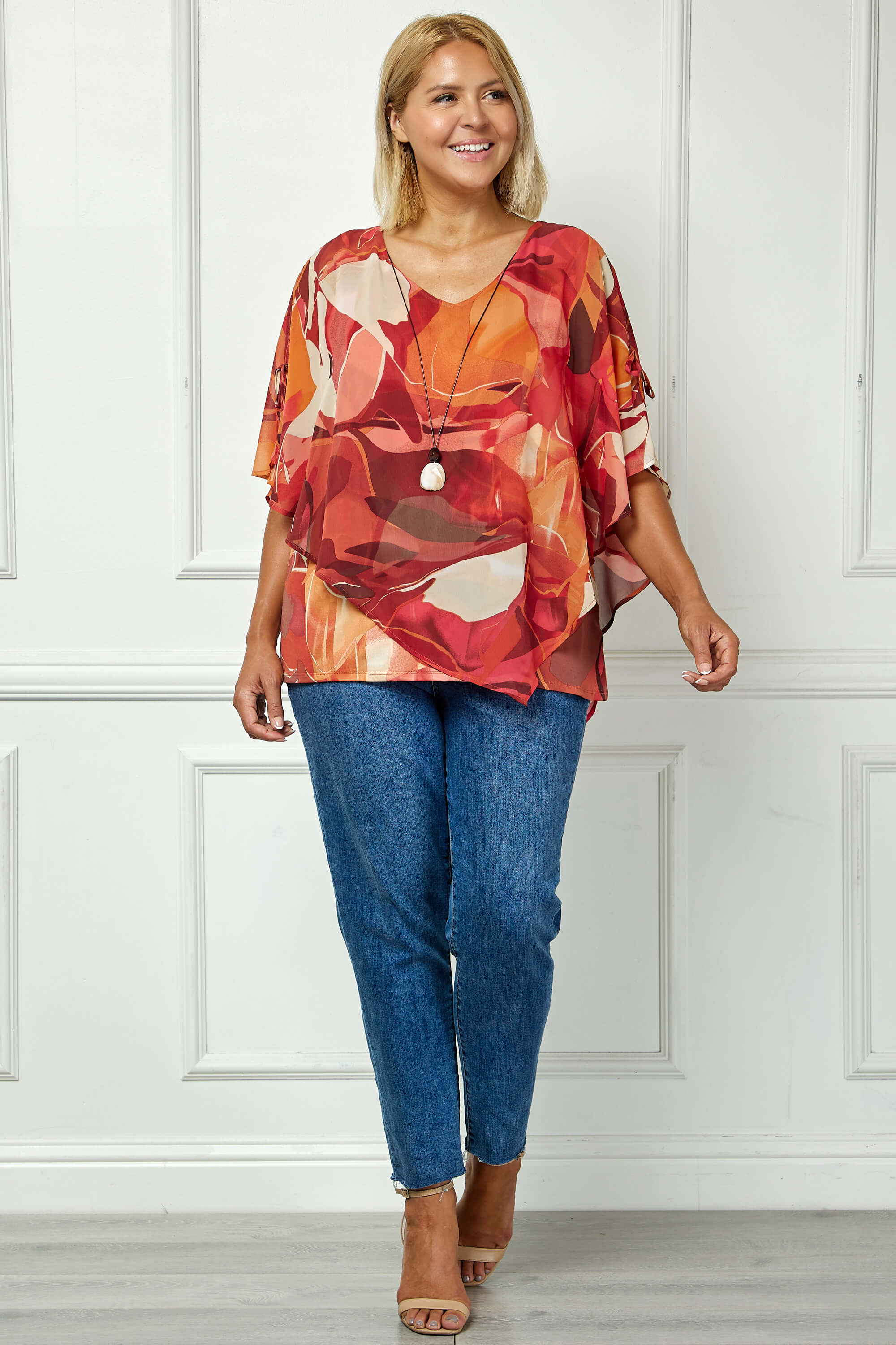 Cold Shoulder V-Neck Hanky Hem Poncho Top in Ivory/Marigold/Orange - Plus